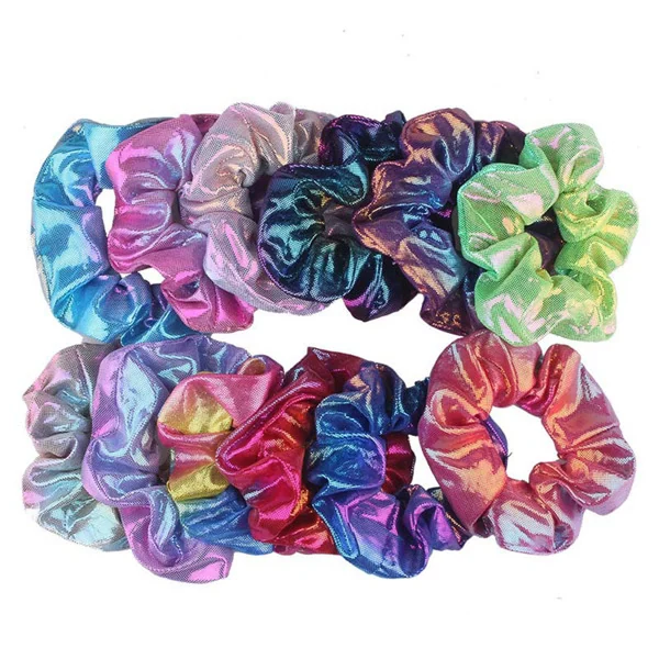 Multiple scrunchies in different colors arranged in a row