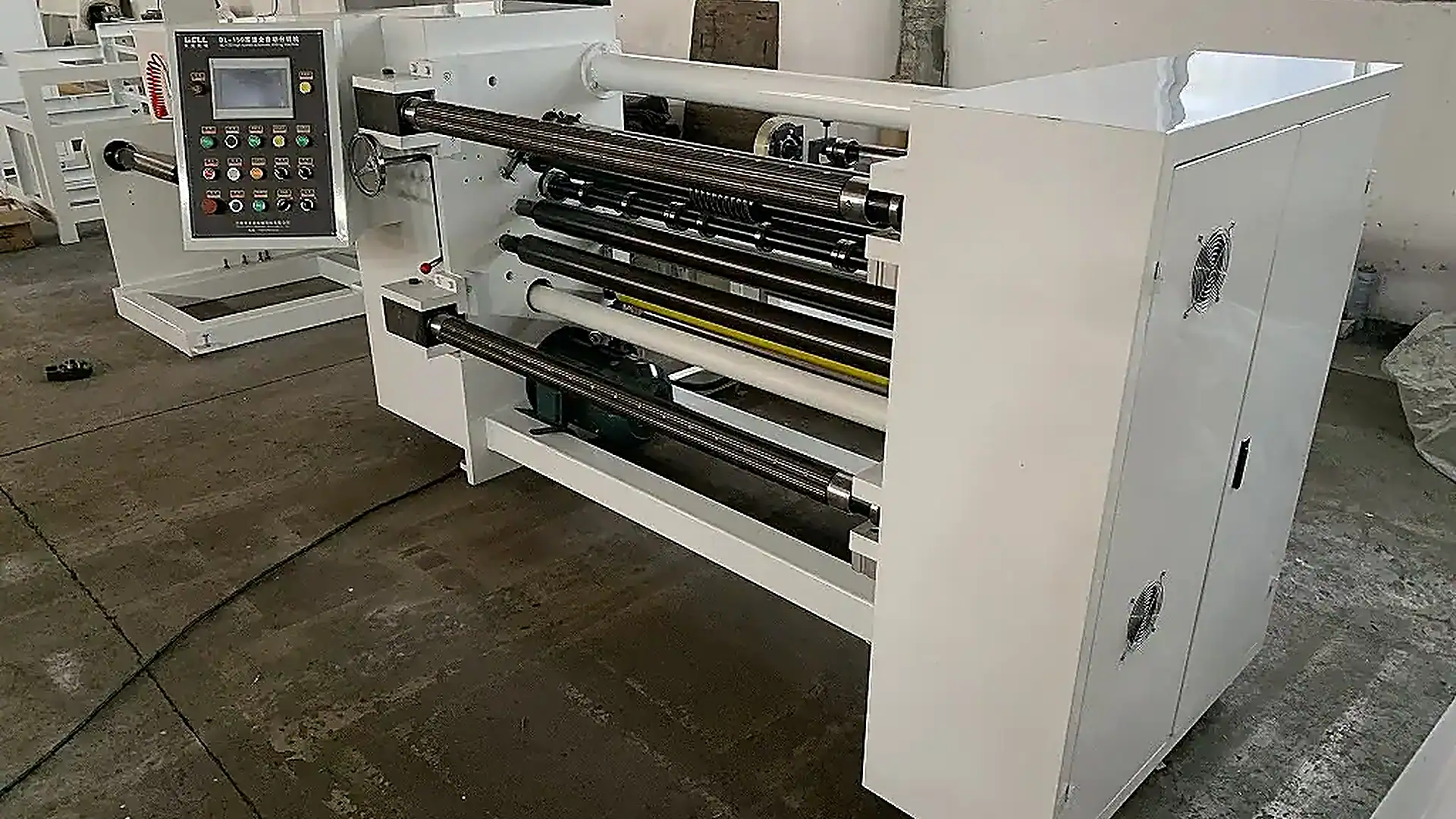 Automatic slitting machine on the floor of a partner factory in China