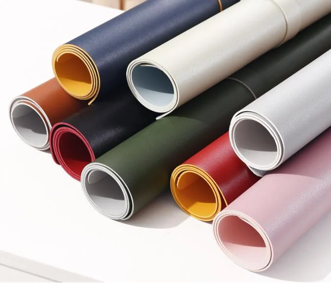 Multiple desk pads in different colours arranged side by side for display