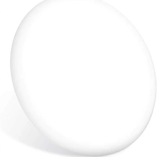 Glowing white oval light therapy lamp shown at an angle against a plain white background
