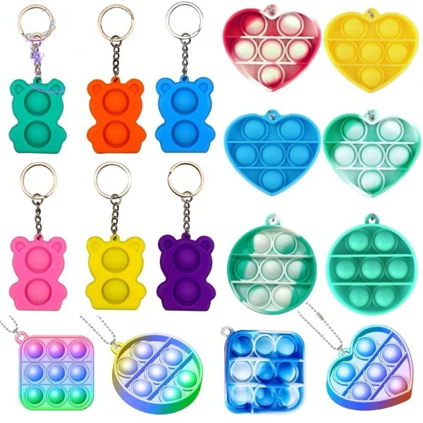 Grid of colorful silicone popping fidget keychain toys in bear, heart, circle and square shapes