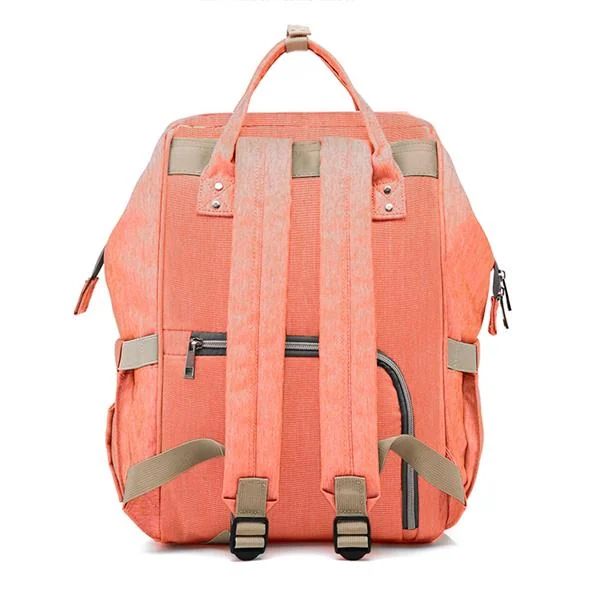Coral pink baby nappy changing backpack shown from the back with padded shoulder straps and top handle