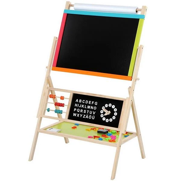Child using the easel at home, drawing on the whiteboard