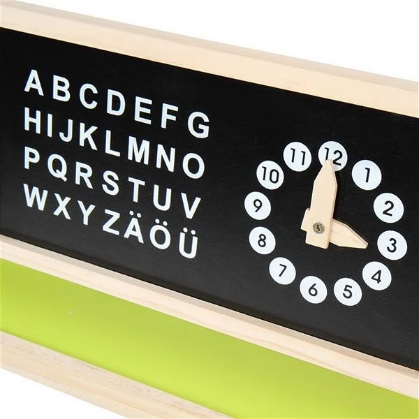 Close-up of a wooden kids easel blackboard panel with printed alphabet letters and a wooden toy clock with numbered discs