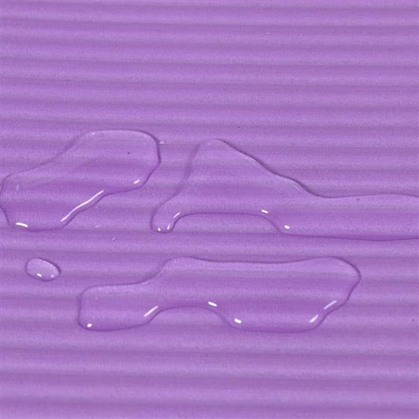 Close-up of a purple NBR yoga mat with ribbed texture and water droplets beading on the surface