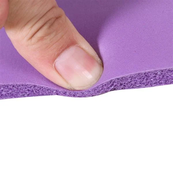 Side view of the 8mm thick yoga mat, demonstrating its cushioning depth