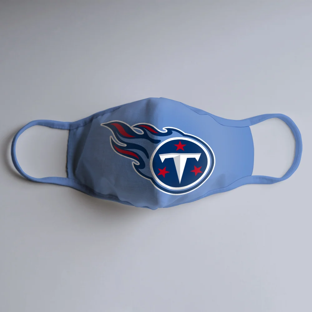 Light blue cloth face mask printed with the Tennessee Titans NFL team logo, shown flat on a white background