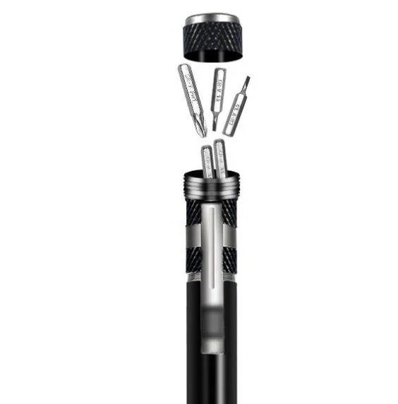 Pen-type screwdriver set placed on a workbench with a smartphone nearby