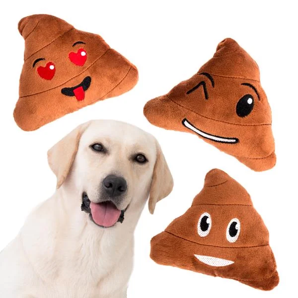 Three brown plush poop emoji dog toys with embroidered faces, one heart-eyed, shown with a yellow Labrador retriever