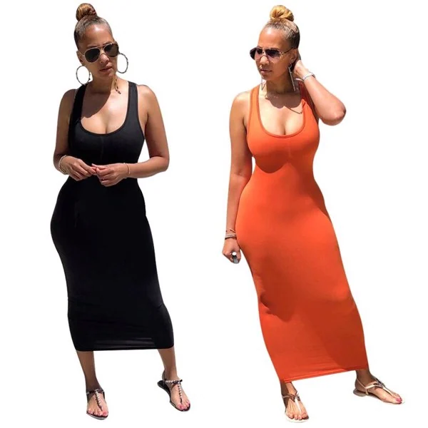 Back view of the orange dress with lace-up closure and full back exposure