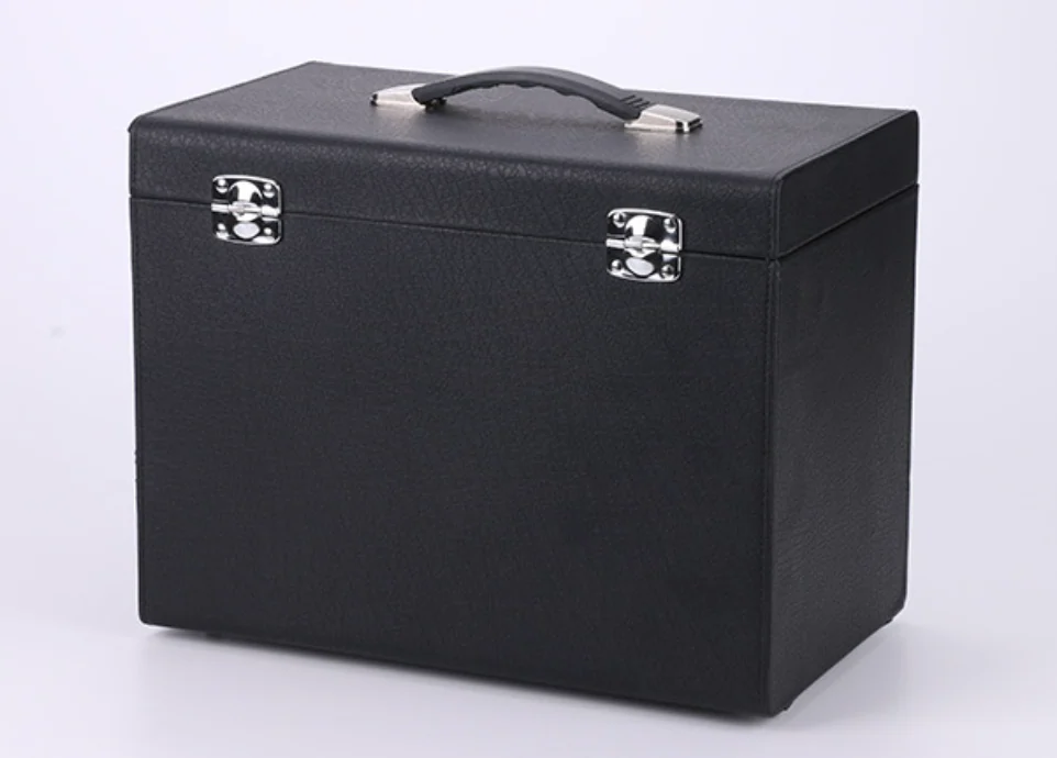 Black hard-shell sewing machine carrying case with chrome latches and a top carry handle, on a white background