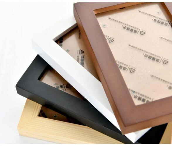 Brown solid wood photo frame with a photo of a family, displayed in a home setting