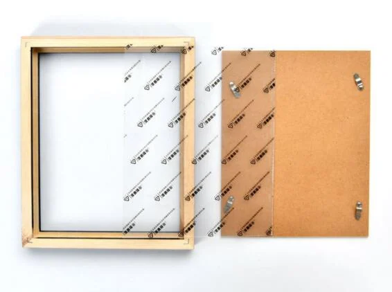 Close-up of the pine wood grain and finish on the frame edge