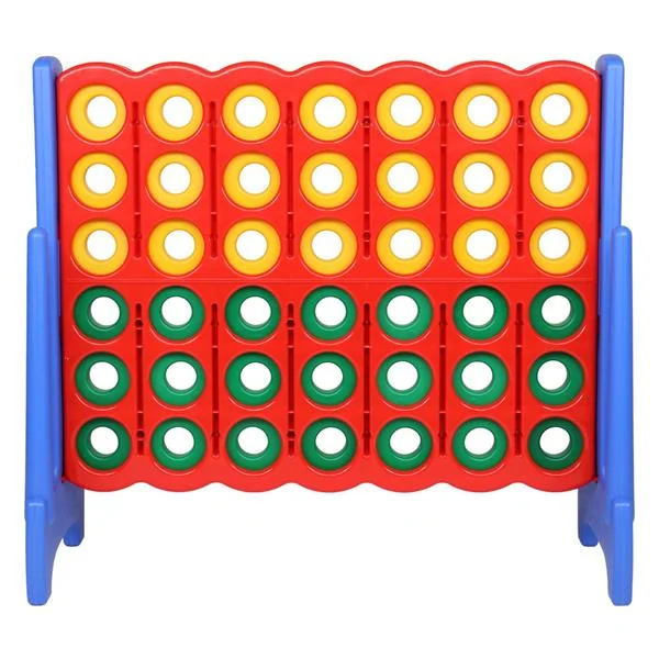 Giant connect-four style game with red grid, blue legs, and yellow and green discs on white background