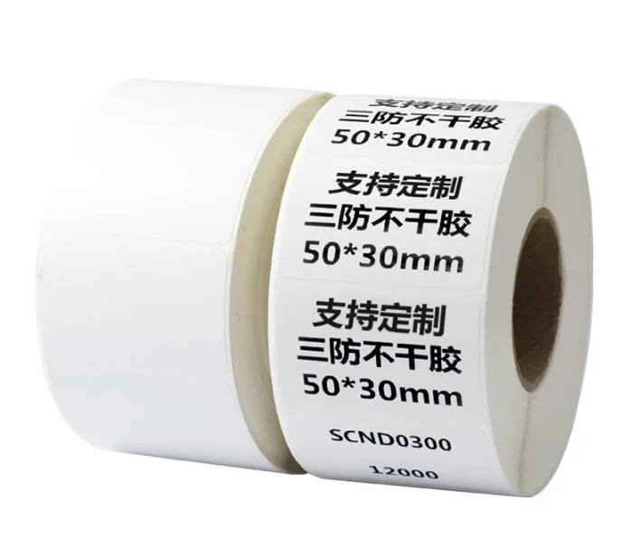 Two rolls of white thermal transfer labels, one roll printed with Chinese characters and 50x30mm size markings