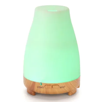 200ml aroma diffuser glowing green with wood-grain base and LIGHT and MIST control buttons