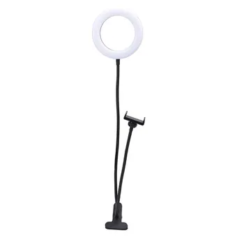White 6 inch LED ring light on flexible black gooseneck with phone holder clip and desk clamp base