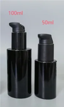 Two black glass bottles with black rotating pump caps, 100ml and 50ml, against a plain light background