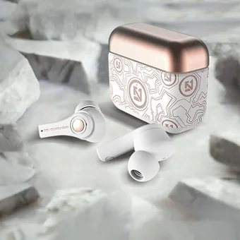 White wireless Bluetooth earbuds with rose gold charging case on white marble background