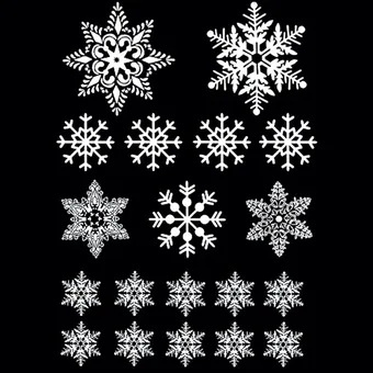 Assorted white snowflake electrostatic window sticker designs displayed on a black background