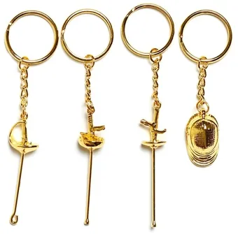 Four gold fencing-themed keychains with split rings, three sword charms and one fencing mask charm