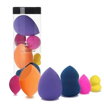 Set of colorful makeup sponges in Rose, Orange, Purple, Navy, Pink, Yellow on a white background