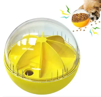 Yellow treat-dispensing dog toy ball with clear dome; inset shows a pug eating kibble from the ball
