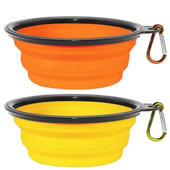 Two collapsible silicone pet bowls, one orange and one yellow, each with a carabiner clip