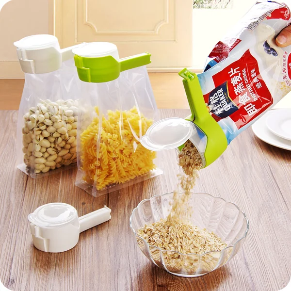 White sealing clip next to a bag of nuts, demonstrating easy pouring