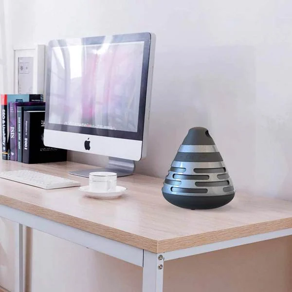 Speaker connected to a smartphone via Bluetooth, with audio playing