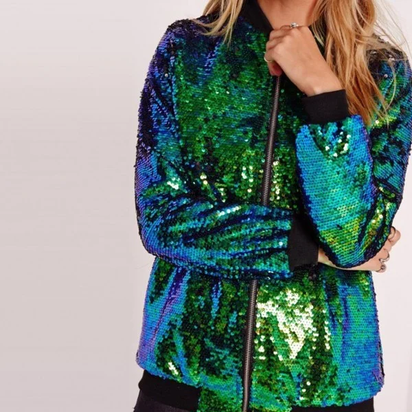 Jacket laid flat with the front zipper open, highlighting the sequin-covered surface