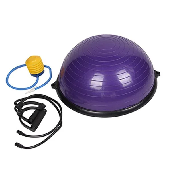 Purple inflatable balance hemisphere placed on a gym floor with a person using it for seated balance training