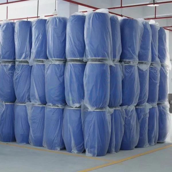 Open top plastic drums arranged on a pallet