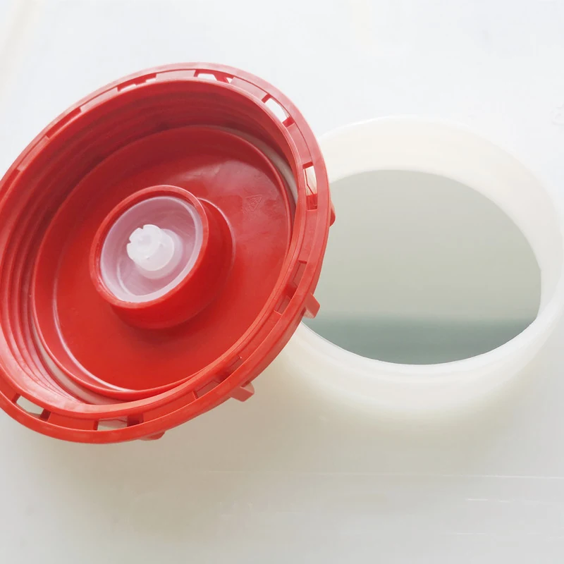 Vented lid fitted to an IBC tank opening