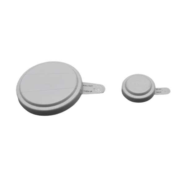 Red and white metal drum cap seals