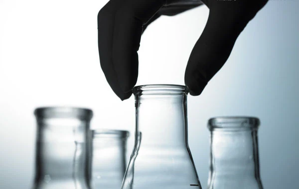 Laboratory glassware used for adhesive testing