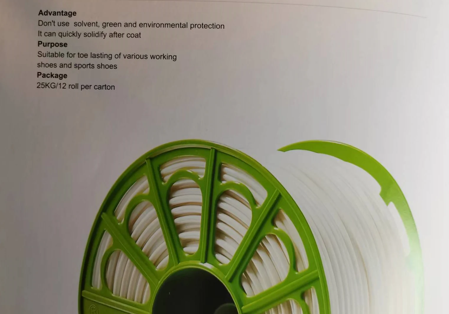 Counter adhesive roll next to its printed specification card
