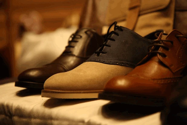 Finished leather shoes on display