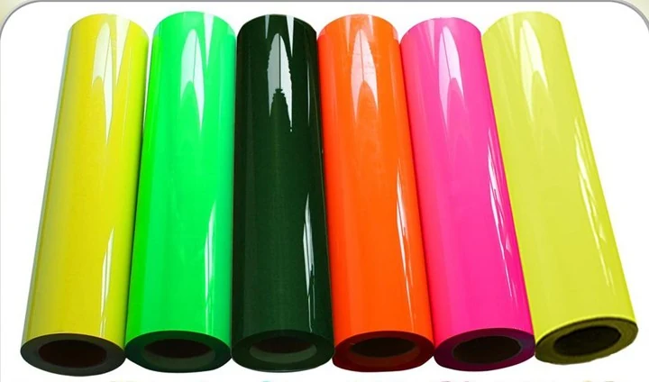 Rolls of thermoplastic adhesive film in several colours