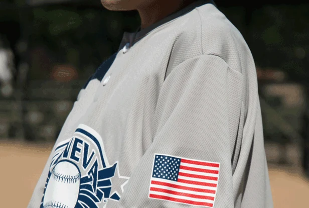 Heat transferred flag badge on the sleeve of a garment