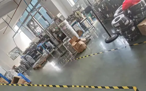 The production floor at the Henglan industrial park, with material staged for the motif workshop.