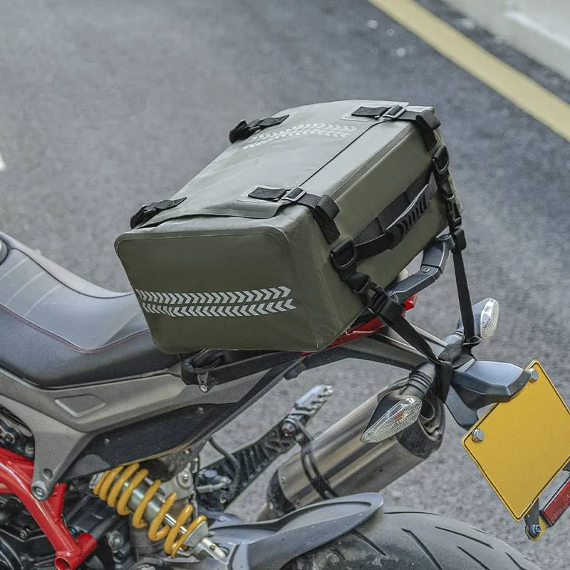Waterproof motorcycle rear rack bag strapped to a rear carrier