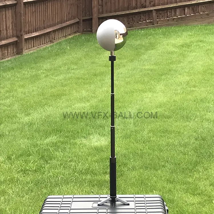 12.6cm half mirror half grey ball mounted on a stand