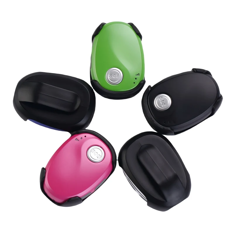 Q20 personal tracker shown with its docking station charger