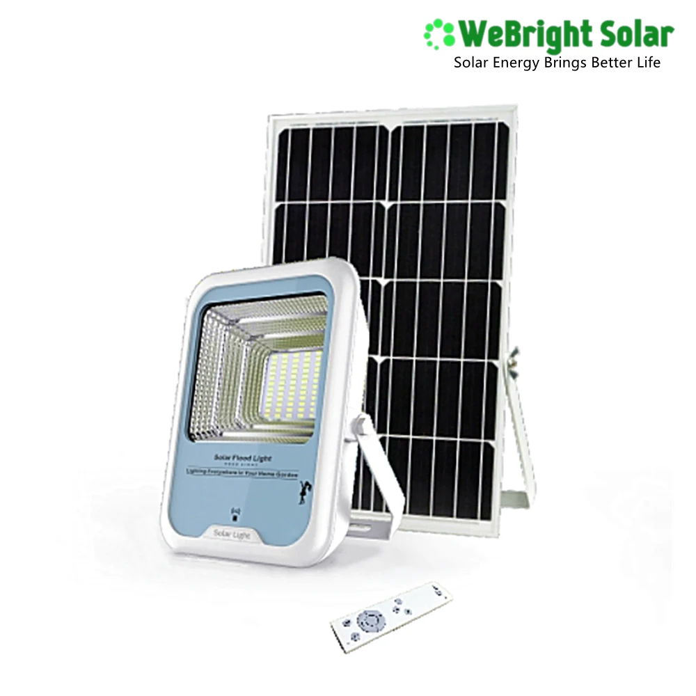 White solar flood light with blue panel, black solar panel, and remote control
