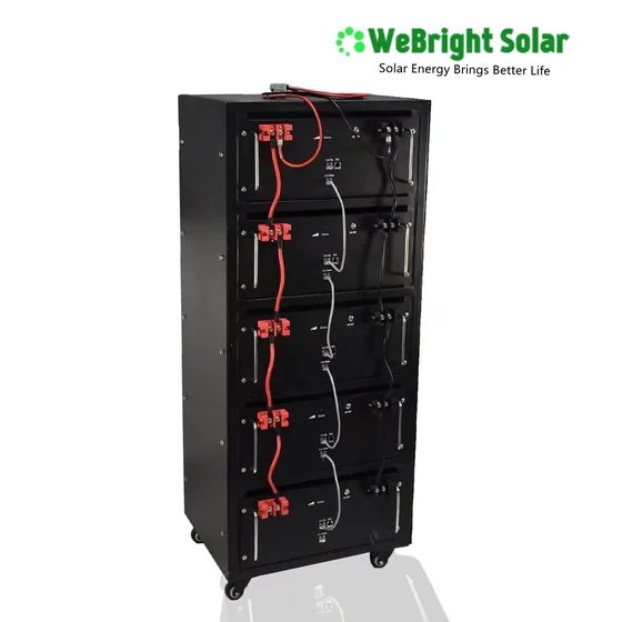 A black, multi-tier industrial equipment rack with red and white wiring on a white background.