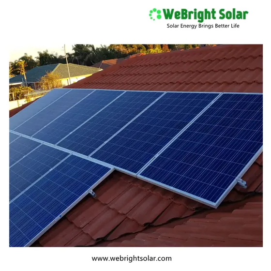 Solar panels installed on a red tiled roof