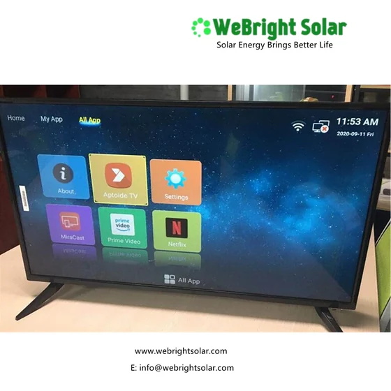 A photograph of a TV screen showing a user interface, with a solar company logo and contact information overlaid on the image.