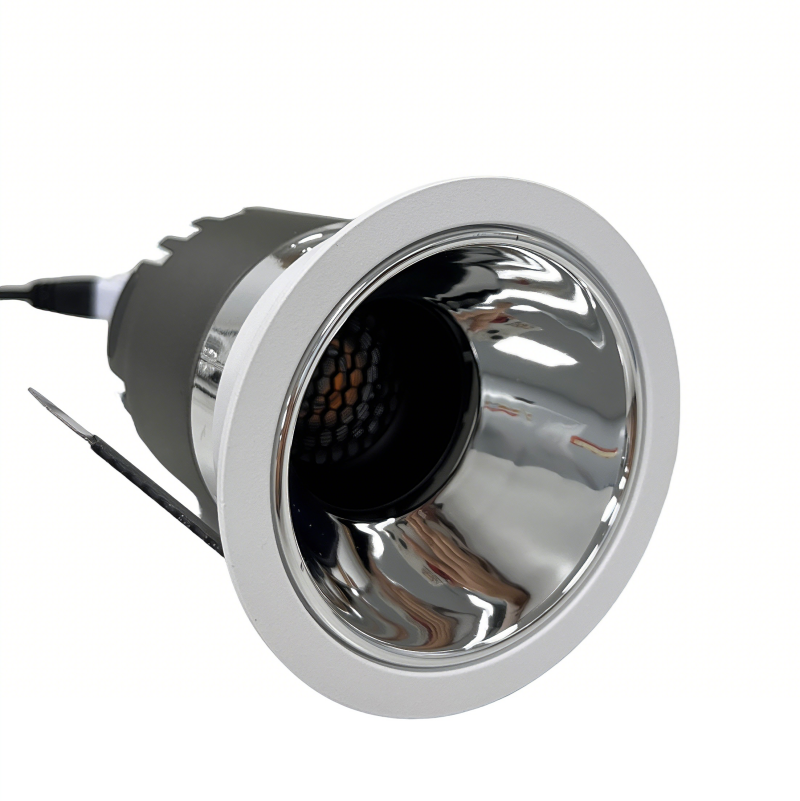 White LED wall lamp mounted on a brick wall casting light downward at night