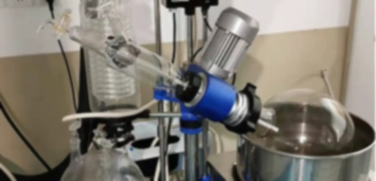 Glassware, condenser and overhead stirrer set up for a scale-up run at WesynTech